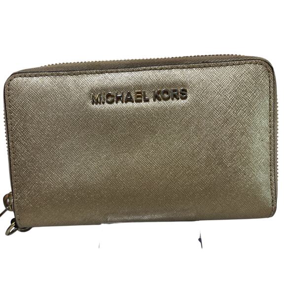 Michael Kors Jet Set Travel Leather Continental Wristlet in a gold metallic - Picture 1 of 7